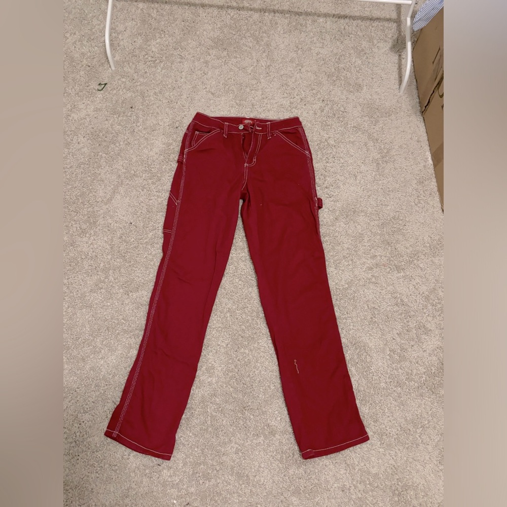Dolls kill Burgundy Dickies pants.